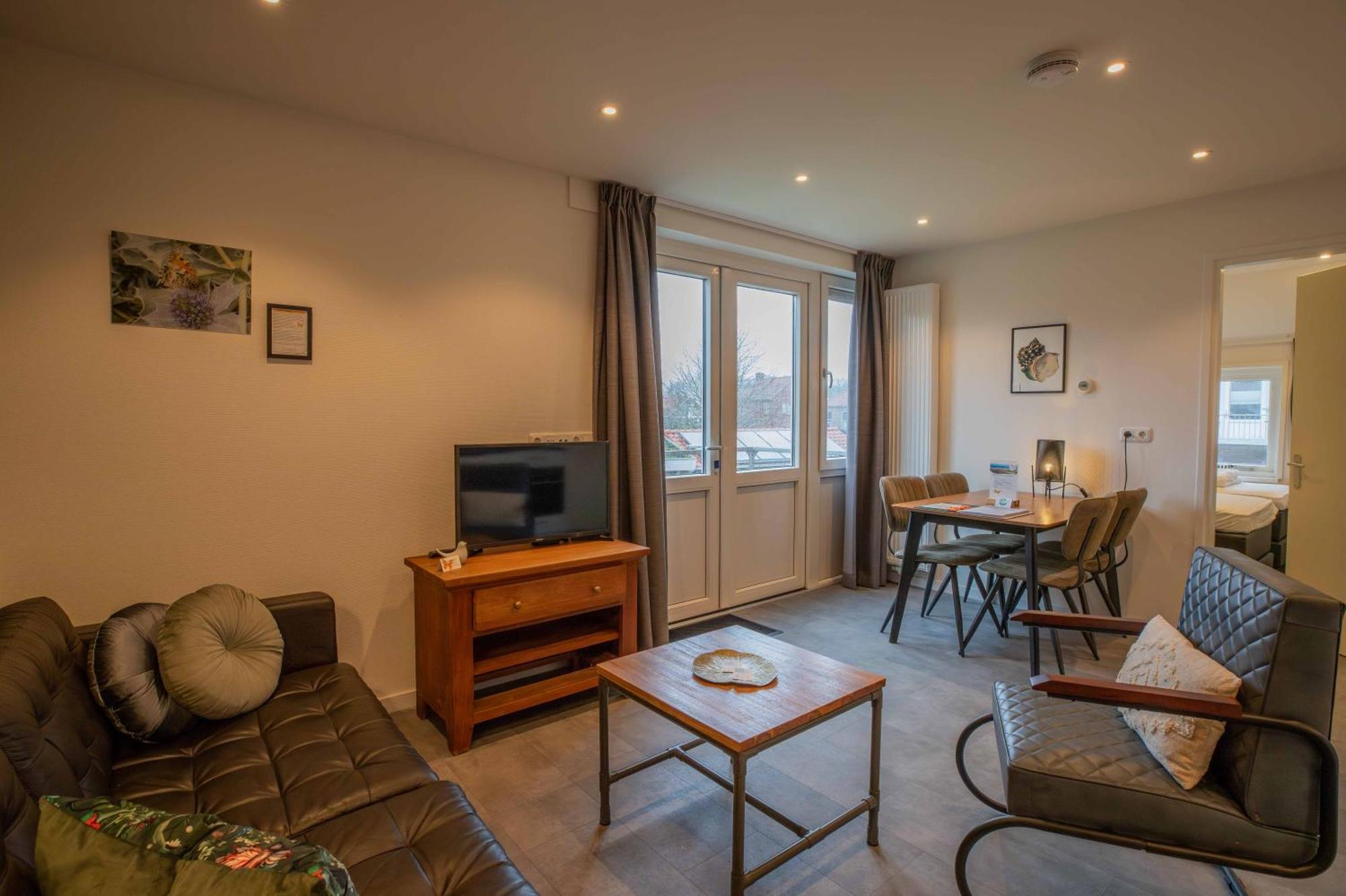 De Vlindertuin Appartement Nes  Kamer foto