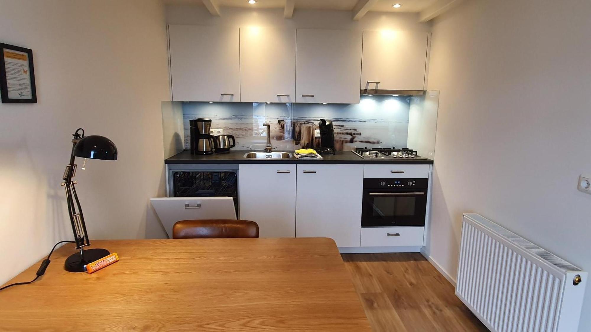 De Vlindertuin Appartement Nes  Kamer foto